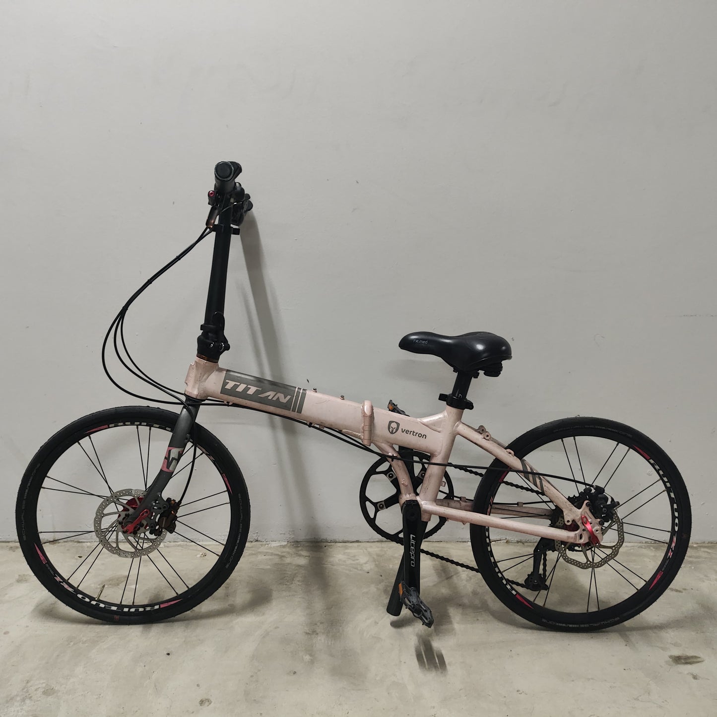 [20] Titan Vertron 9-Speed Foldable Bicycle (Light Pink) [Used]